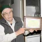 Andrew auctioneer recognized for 60 years in the ring