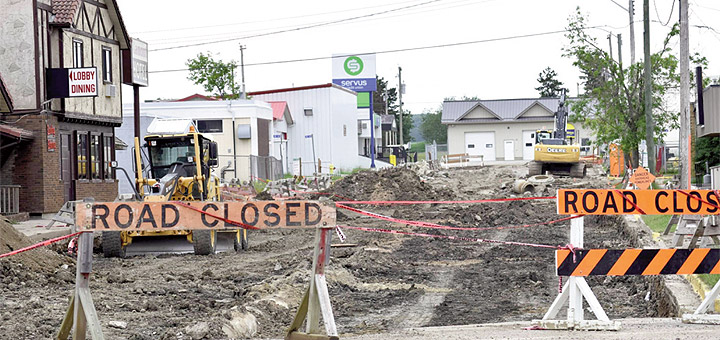 Lamont road project hit by cost overruns