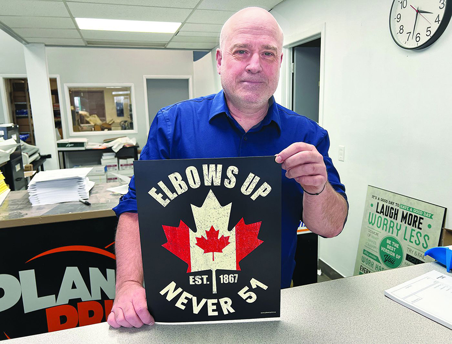 Ontario printer spreading pro-Canada message with ‘Elbows Up’ posters